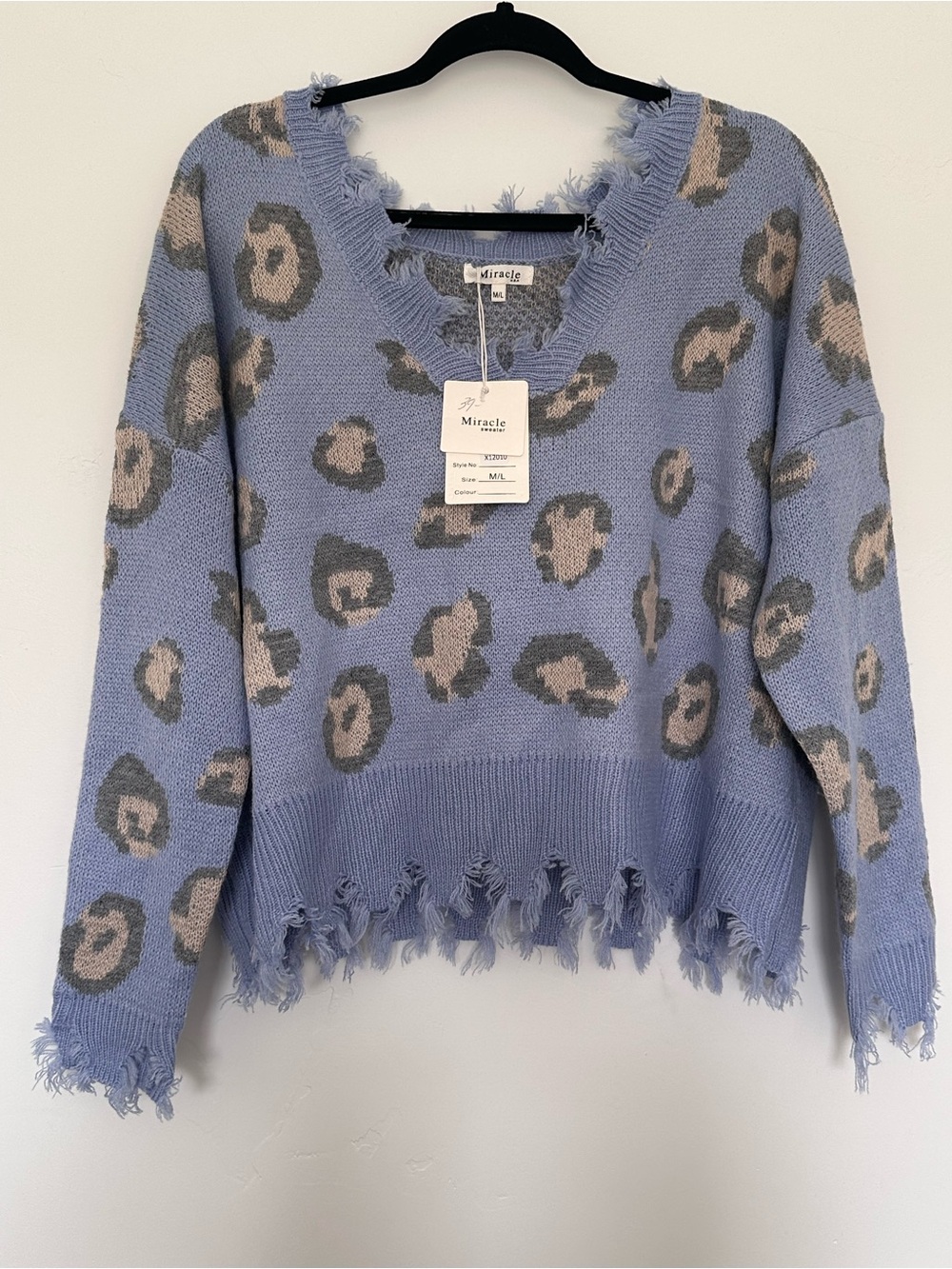 Miracle Light Blue Leopard-Print Distressed V-Neck Sweater